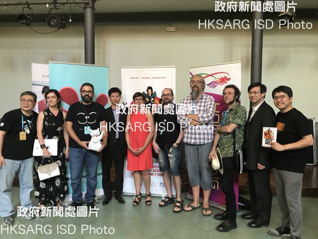 With the support of the Hong Kong Economic and Trade Office in Brussels (HKETO, Brussels), the Asian Summer Film Festival in Vic, near Barcelona in Spain, celebrated the role of women in Hong Kong action movies in its 14th edition from July 18 to 23 (Vic time). Photo shows (from left) the subject of the documentary "The Posterist", Yuen Tai-yung; the Councillor for Culture of the Vic City Council, Mrs Susagna Roura; the festival director, Mr Quim Crusellas; the Deputy Representative of HKETO, Brussels, Mr Sam Hui; Councillor of the County Council of Osona Mrs Milagros Martinez; the authors of the book "Kung Fu Girls!", Domingo Lopez and Jorge Endrino; the illustrator of the book, Toni Benages; the Assistant Representative of HKETO, Brussels, Mr K K Yeung; and the director of "The Posterist", Hui See-wai, at the reception hosted by the HKETO, Brussels at the Asian Summer Film Festival on July 22 (Vic time).