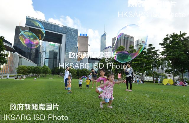 Our photographers captured people relaxing around town - rollerblading, kite flying, splashing around, chilling on the beach, blowing bubbles in the park, and fishing ... it's a whole lot of fun!