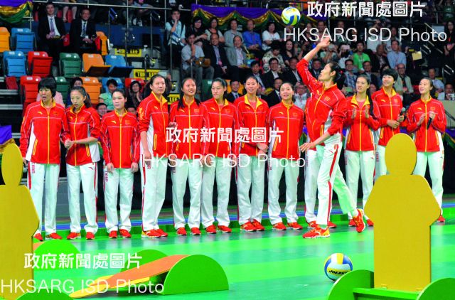 The Olympic spirit comes to Hong Kong with a visit by  the Mainland's volleyball gold medallists, seen here displaying their skills at Queen Elizabeth Stadium.