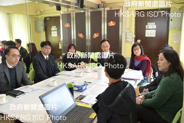 The Secretary for Constitutional and Mainland Affairs, Mr Patrick Nip, visited the hotline service centre for sexual minorities operated by the Tung Wah Group of Hospitals today (February 12). Photo shows Mr Nip (fourth left) being briefed on the services and operation of the hotline centre.