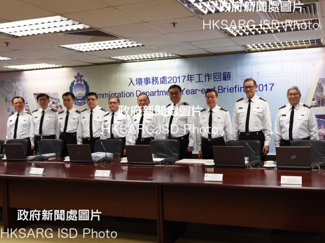 The Director of Immigration, Mr Tsang Kwok-wai (fifth right), chairs the press conference of the Immigration Department's year-end review of 2017 today (February 13).