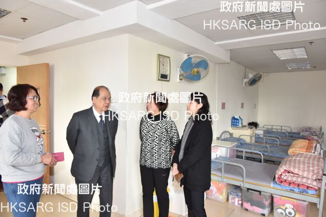The Chief Secretary for Administration, Mr Matthew Cheung Kin-chung (second left), visits a rehabilitation centre under the Bought Place Scheme for Private Residential Care Homes for Persons with Disabilities today (February 14) and tours the facilities.